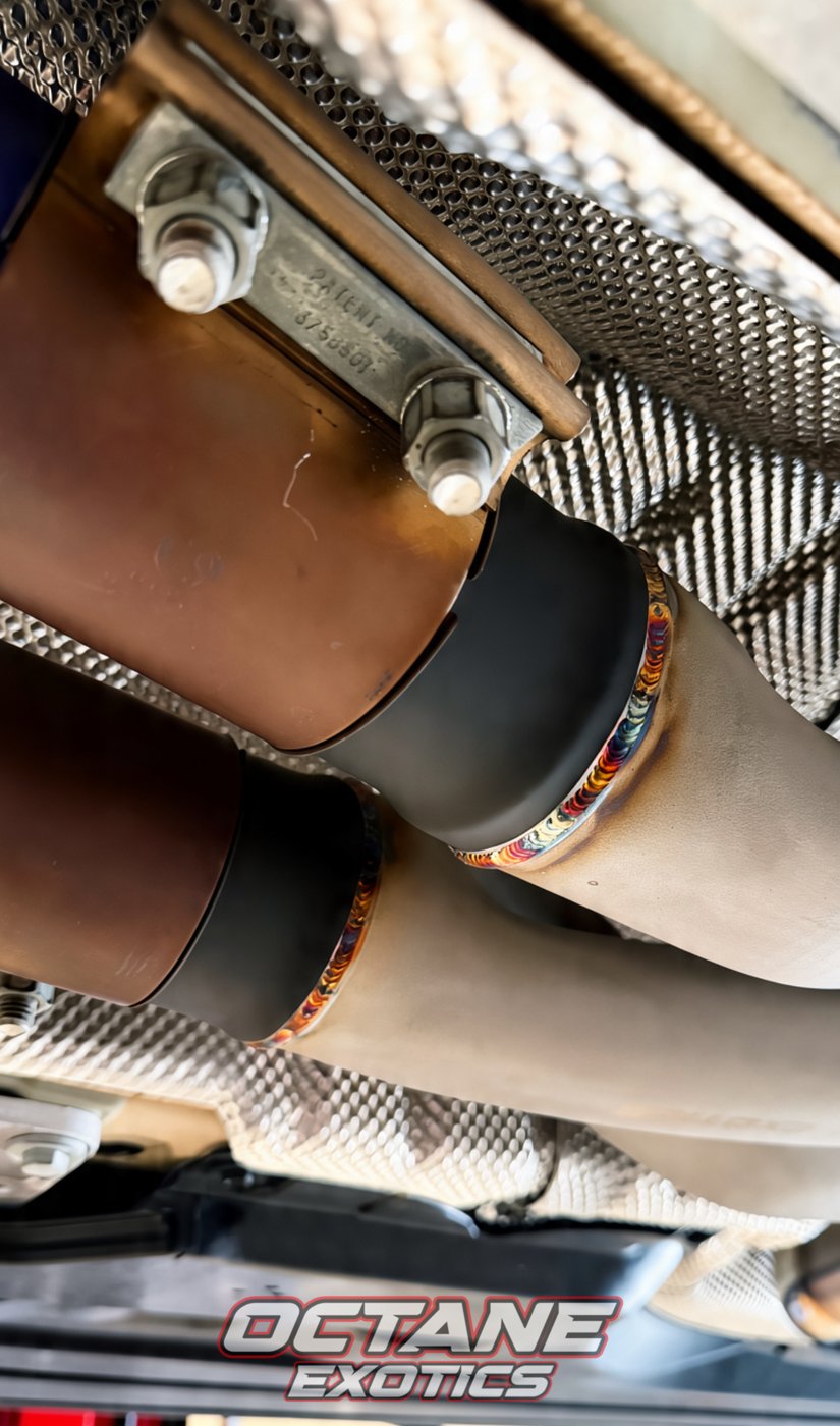 Valved muffler — underside